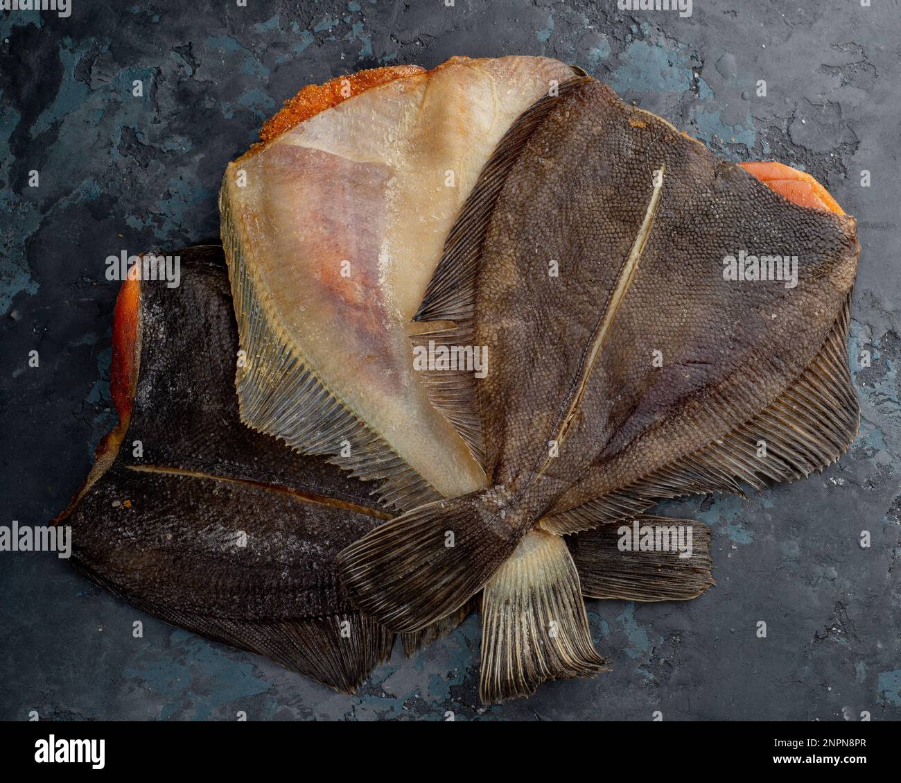 Salted dried flounder. Stockfish. Fish appetizer for beer Stock Photo