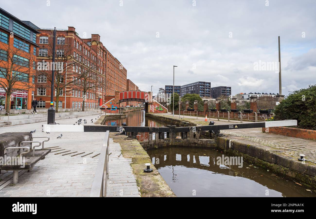 Rochdale Canal lock 82 seen in front of the pretty red bridge at ...