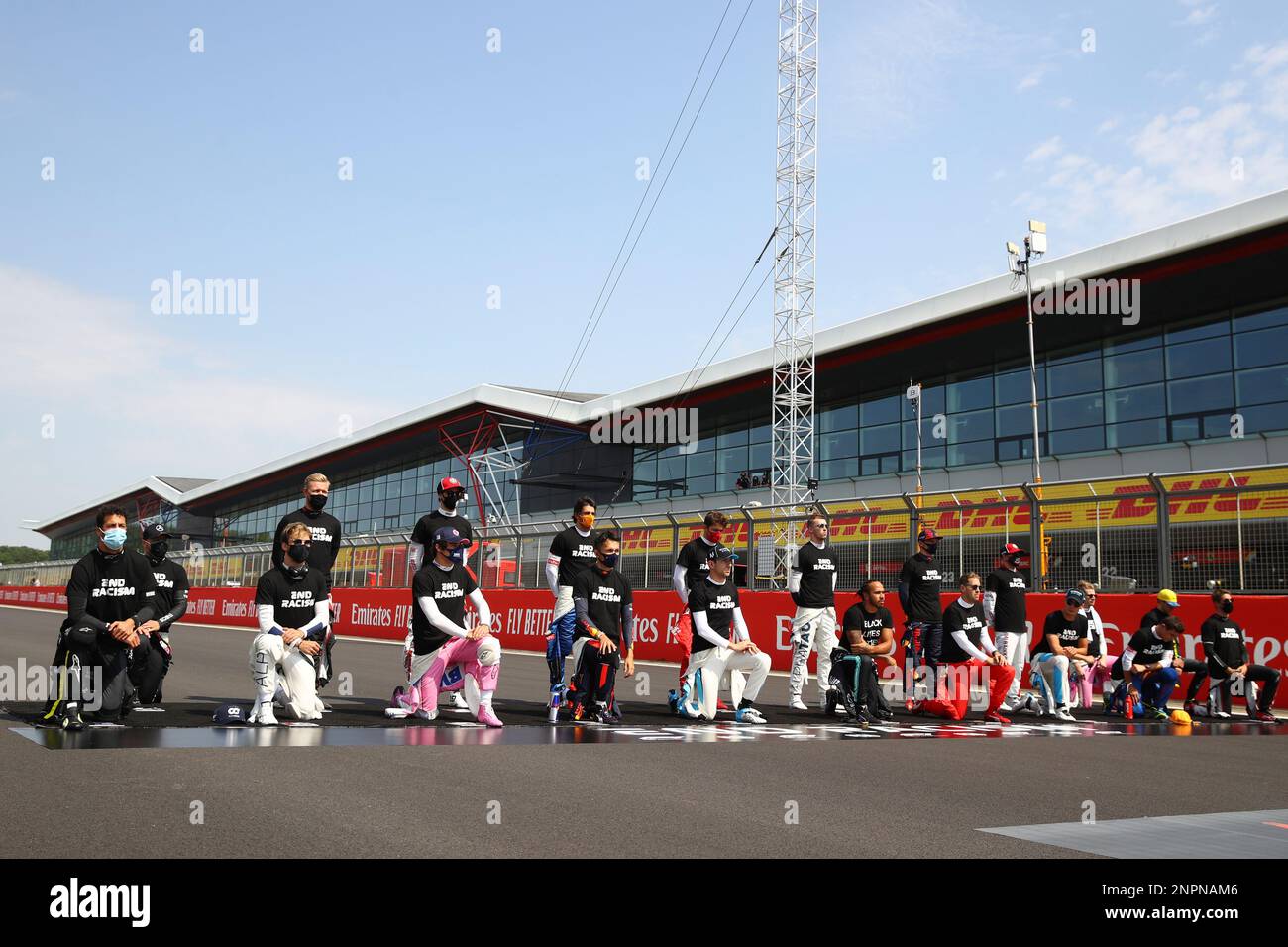 drivers-kneel-during-anti-racist-demonstration-ahead-of-the-70th