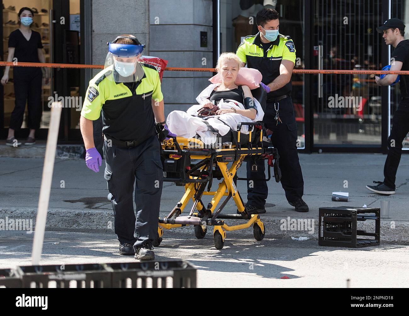A woman is shown injured after a jeep sped down a pedestrian zone on ...