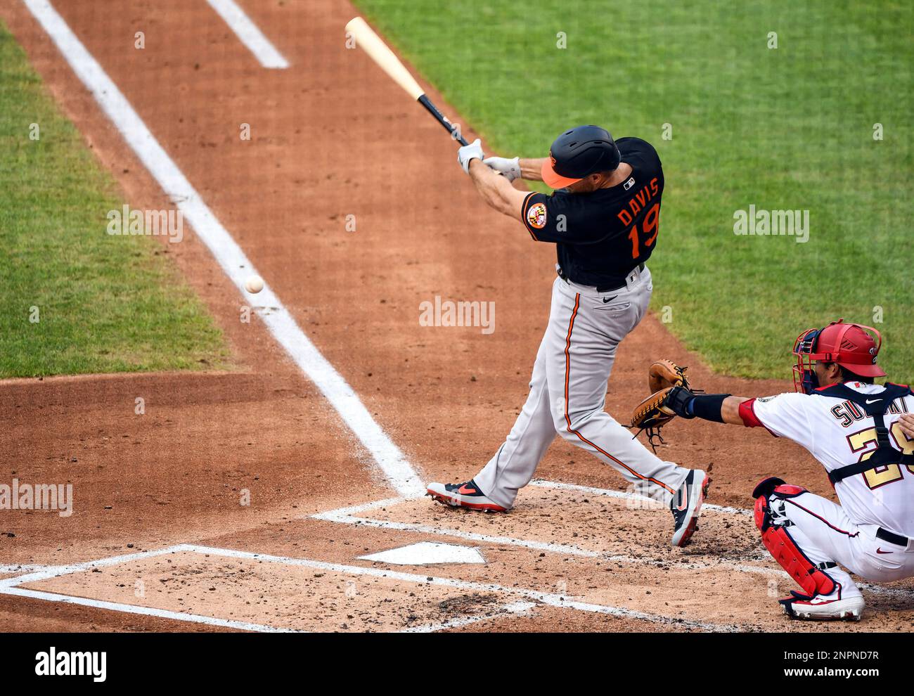 WASHINGTON, DC - AUGUST 07: Baltimore Orioles first baseman Chris Davis  (19) hits a double down the line during the game against the Washington  Nationals on August 7, 2020, at Nationals Park