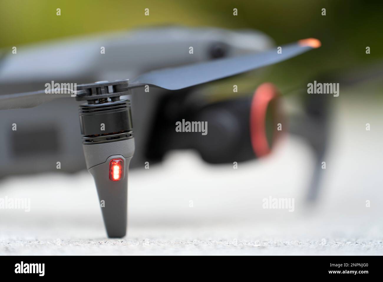 Closeup of motor and propeller of drone quadcopter for taking video and pictures. Preflight checking of before takeoff. Stock Photo