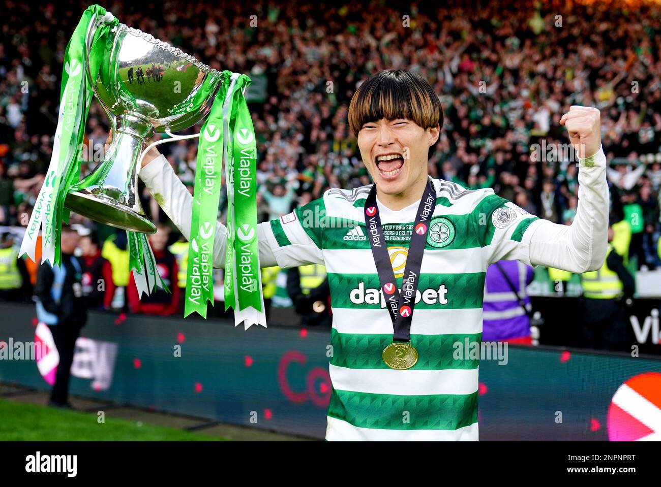Celtic's Kyogo Furuhashi celebrates with the Viaplay Sports Cup trophy