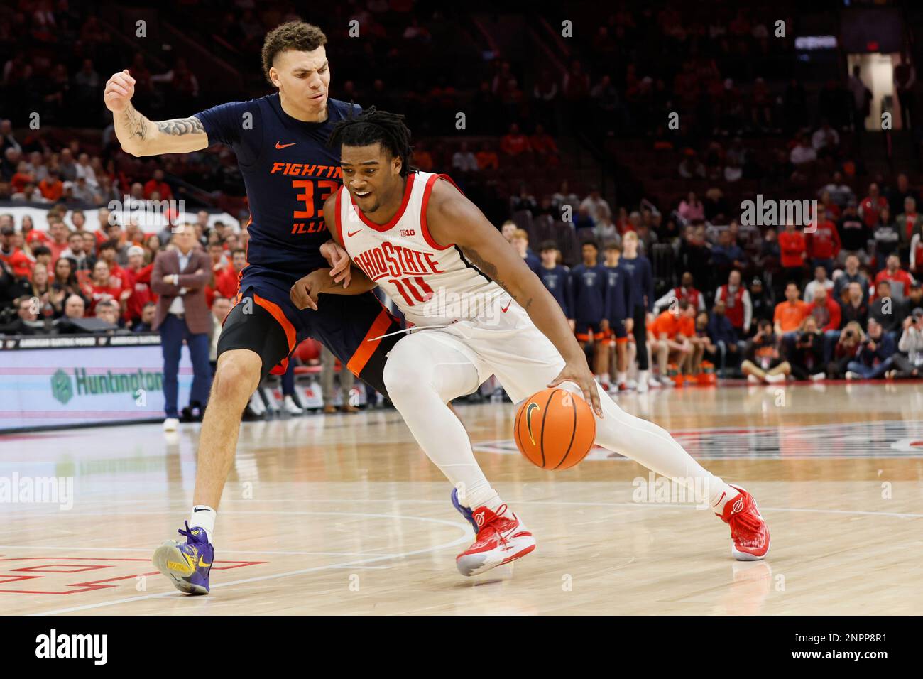 Ohio State's Brice Sensabaugh, right, drives to the basket as Illinois