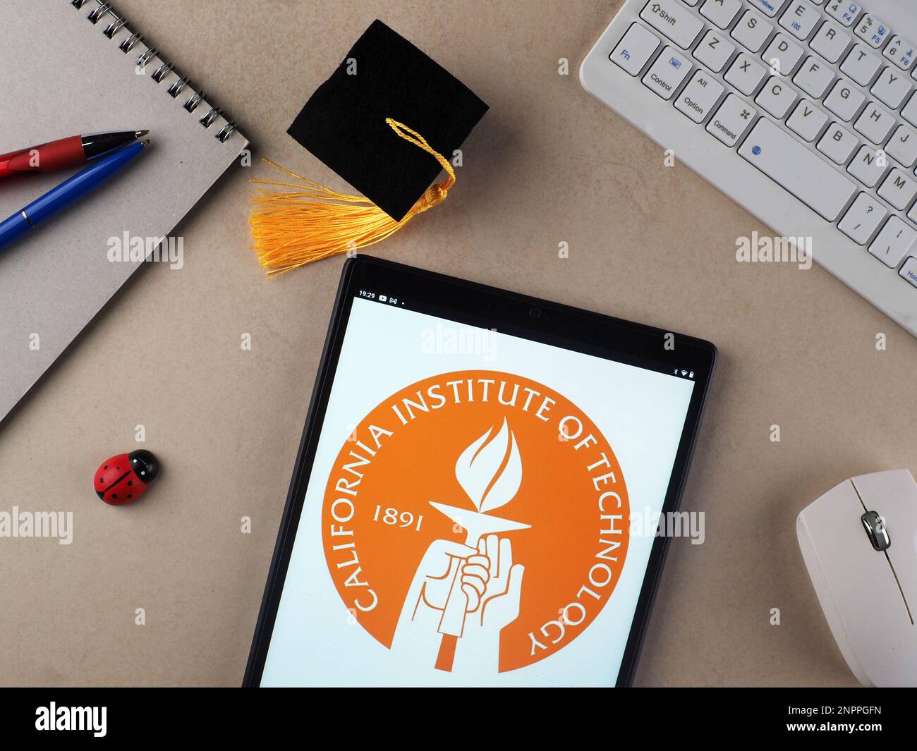 In this photo illustration, California Institute of Technology (Caltech)  logo seen displayed on a tablet. Stock Photo