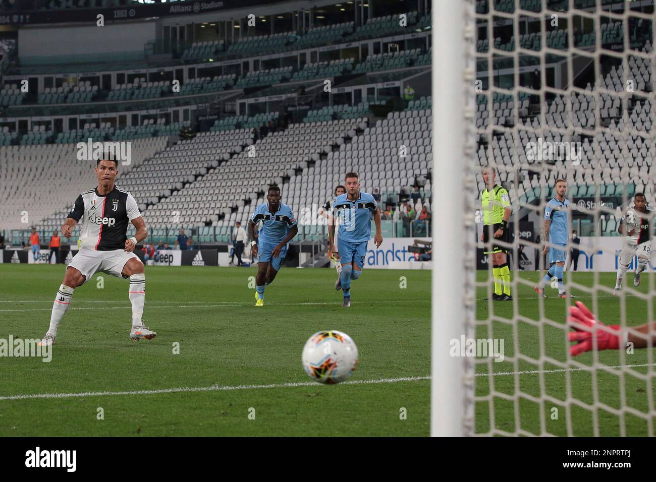 July 20, 2020, Turin, United Kingdom: Portuguese striker Cristiano Ronaldo  of Juventus scores form the penalty mark to give the side a 1-0 lead during  the Serie A match at Allianz Stadium,
