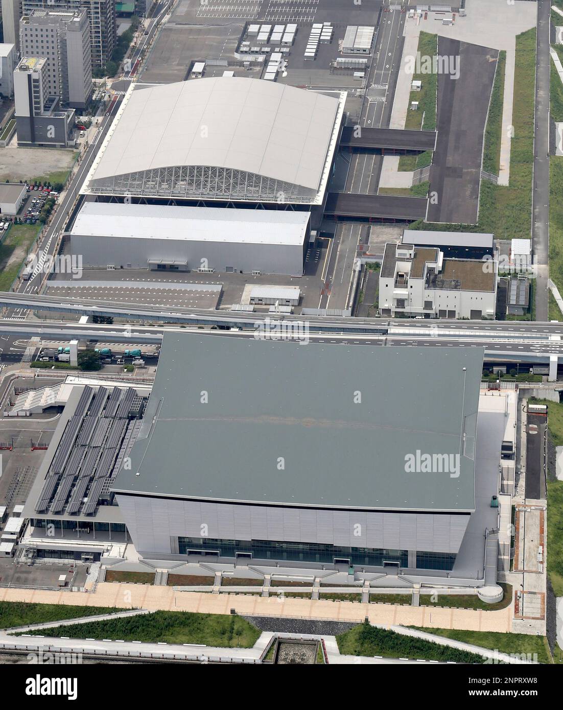 An aerial photo shows Ariake Arena (front) for Volleyball and Ariake