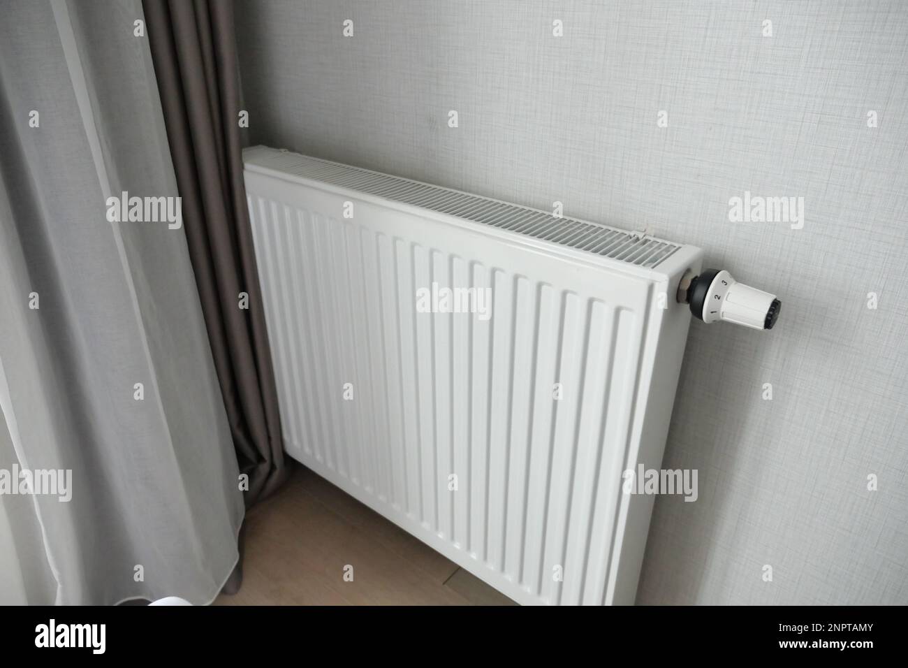 heating radiator under window in the room Stock Photo Alamy