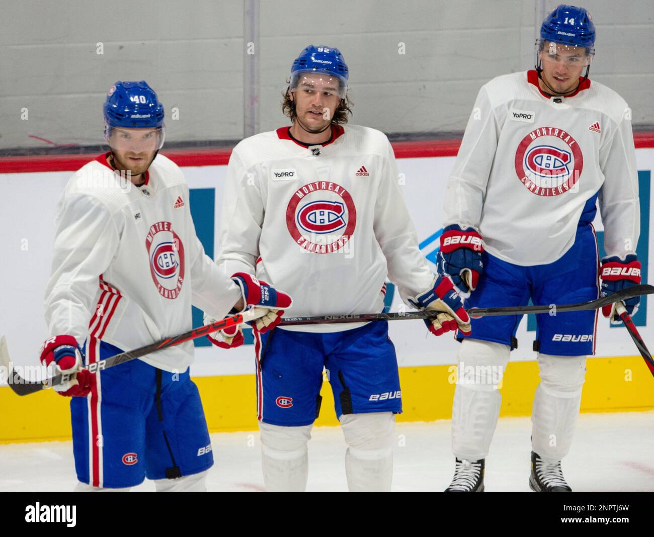 Montreal Canadiens forwards Joel Armia, left, Jonathan Drouin, center
