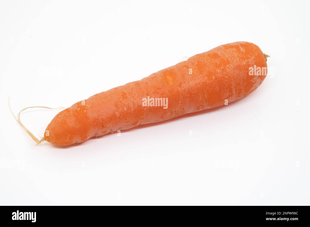 Raw carrots isolated on a white background Stock Photo