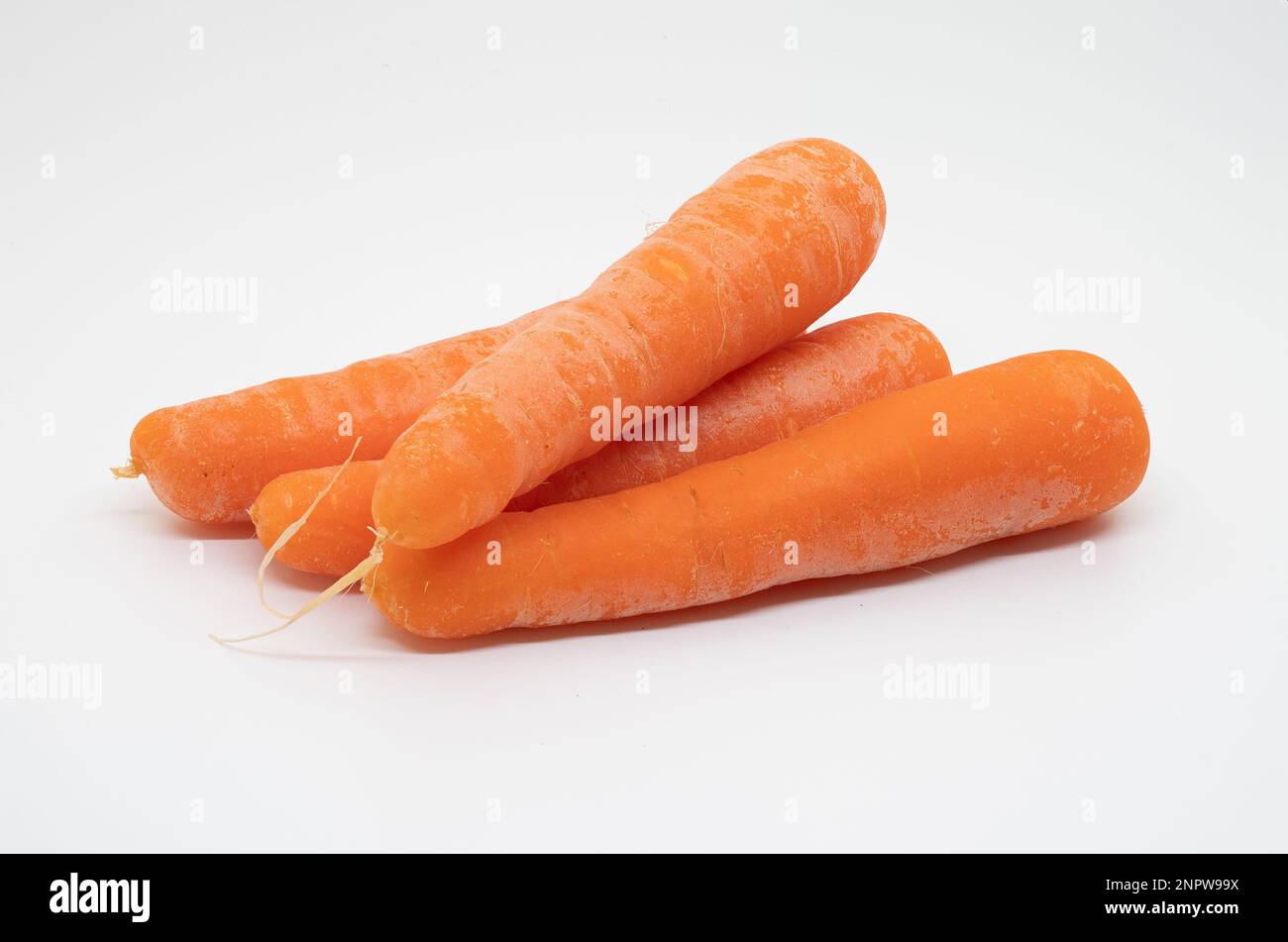 Raw carrots isolated on a white background Stock Photo