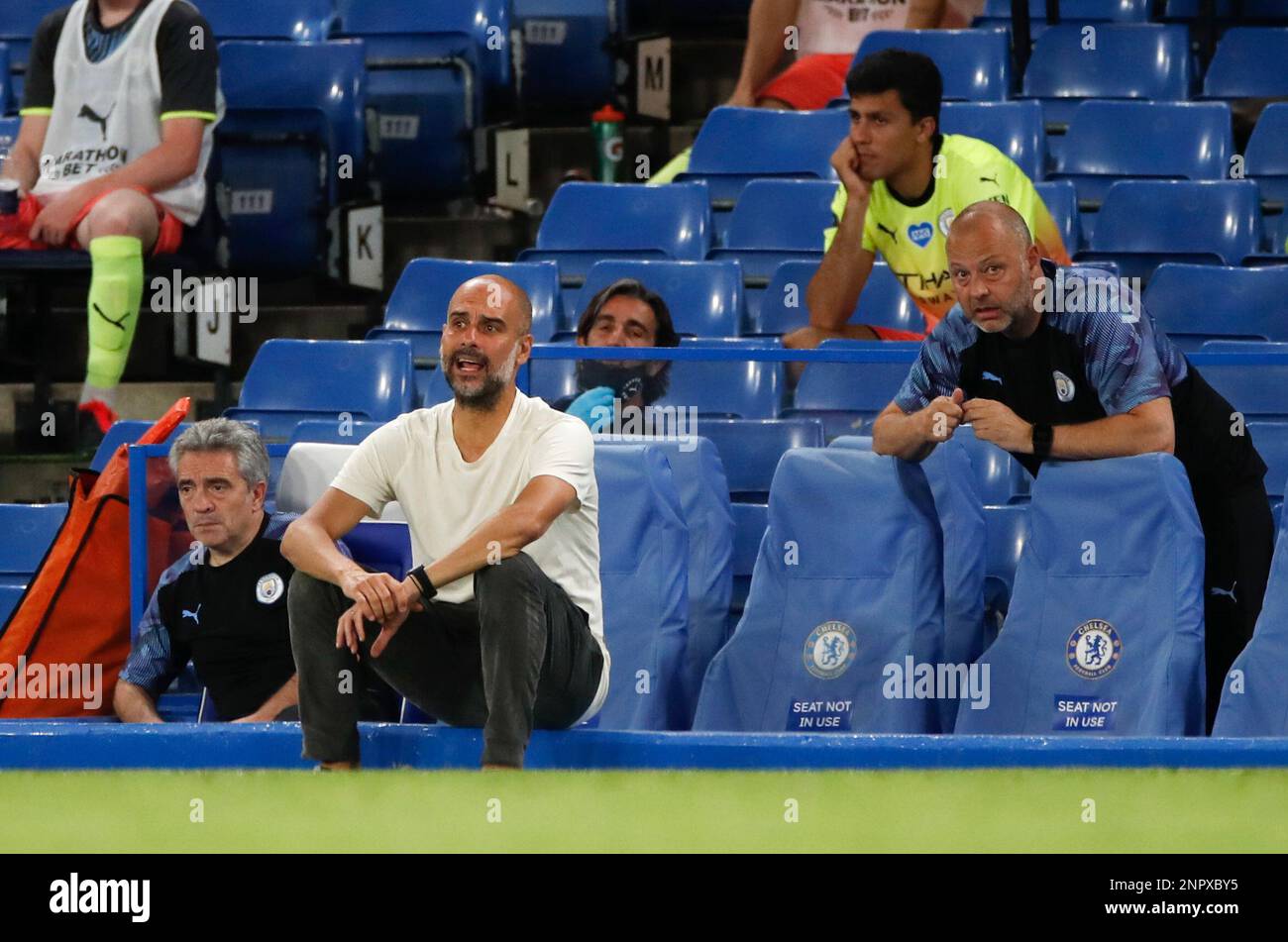 Manchester City's head coach Pep Guardiola reacts during the English ...