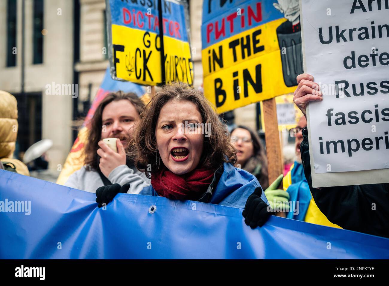 Woman supporting Ukraine at a protest Stock Photo