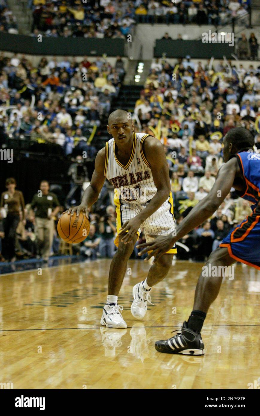 Indiana Pacers forward Ron Artest (91) makes a move with the basketball against the New York Knicks during an NBA game, Saturday Nov. 13, 2004 in Indianapolis. (Kevin Reece via AP) Stock Photo