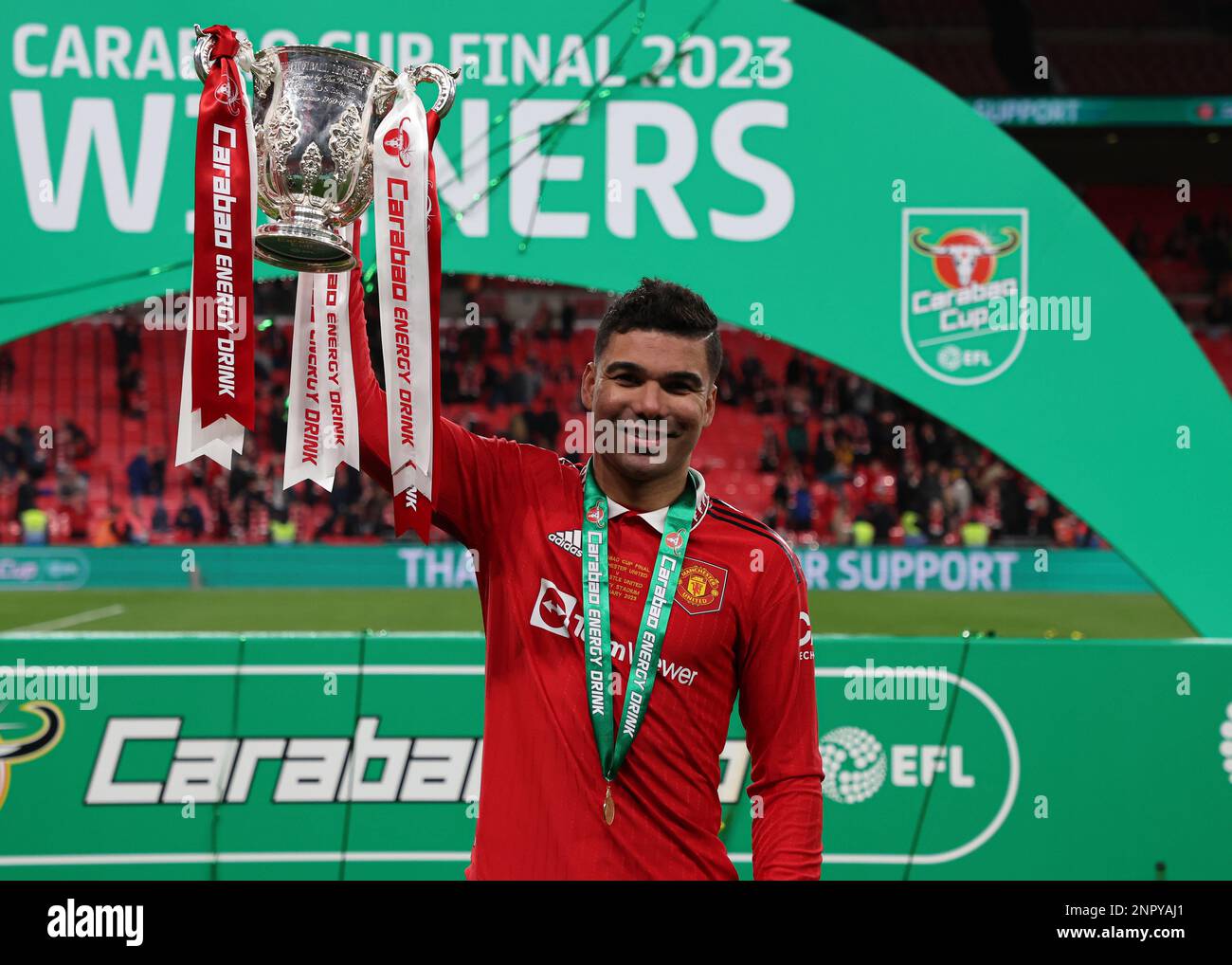 Wembley Stadium, London, UK. 26th Feb, 2023. Carabao League Cup Final Football, Manchester United versus Newcastle United; Casemiro of Manchester United poses with the EFL Cup trophy Credit: Action Plus Sports/Alamy Live News Stock Photo