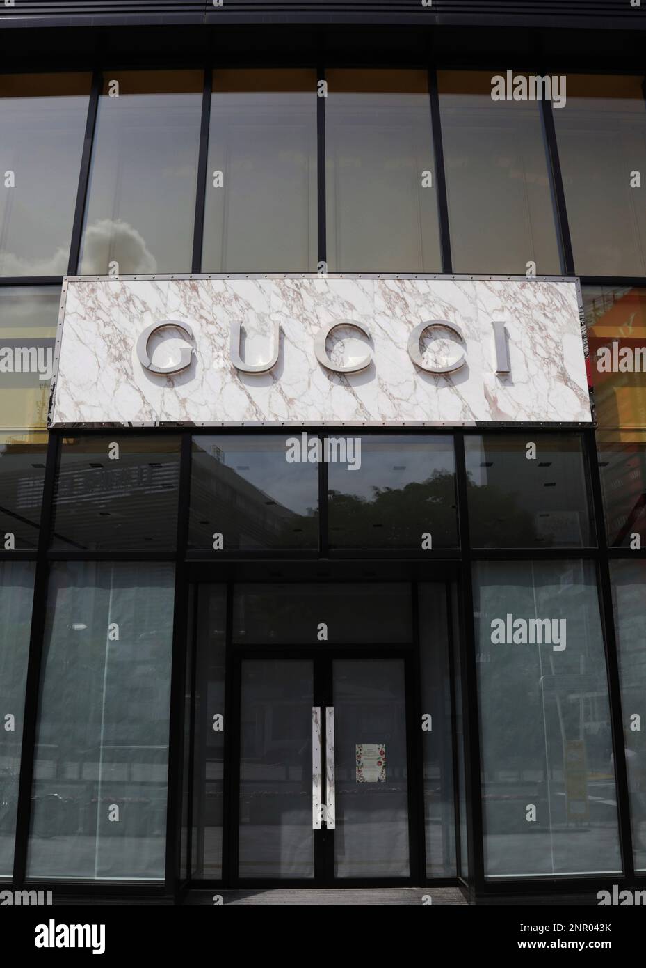 The logo of Gucci is seen in Shinjuku Ward, Tokyo on May 5, 2020. Gucci is  an Italian luxury brand of fashion and leather goods. Gucci was founded by  Guccio Gucci in
