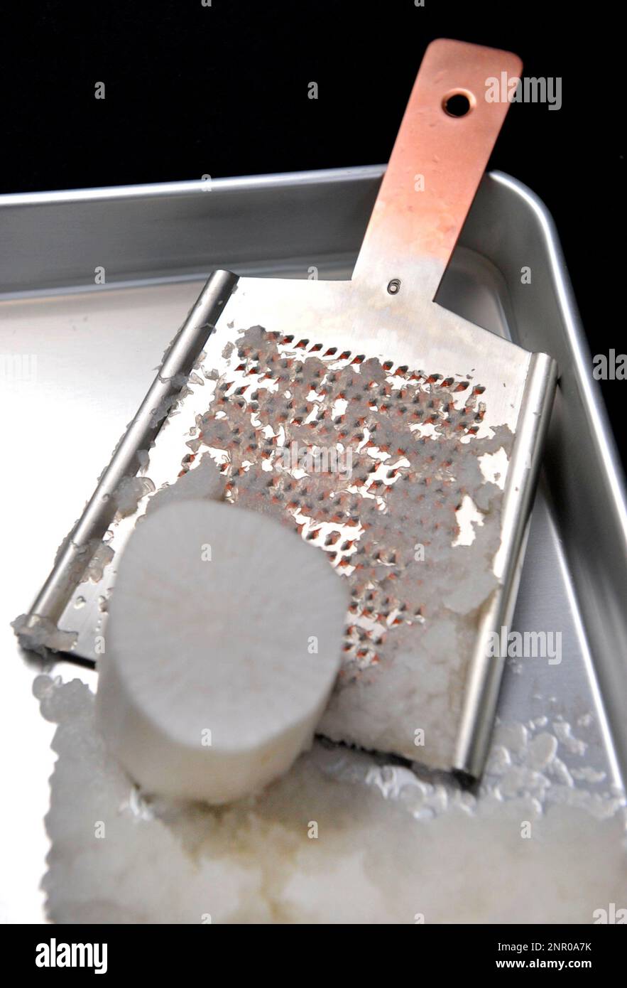 A picture shows Japanese grater, Oroshigane, and grated Japanese radish