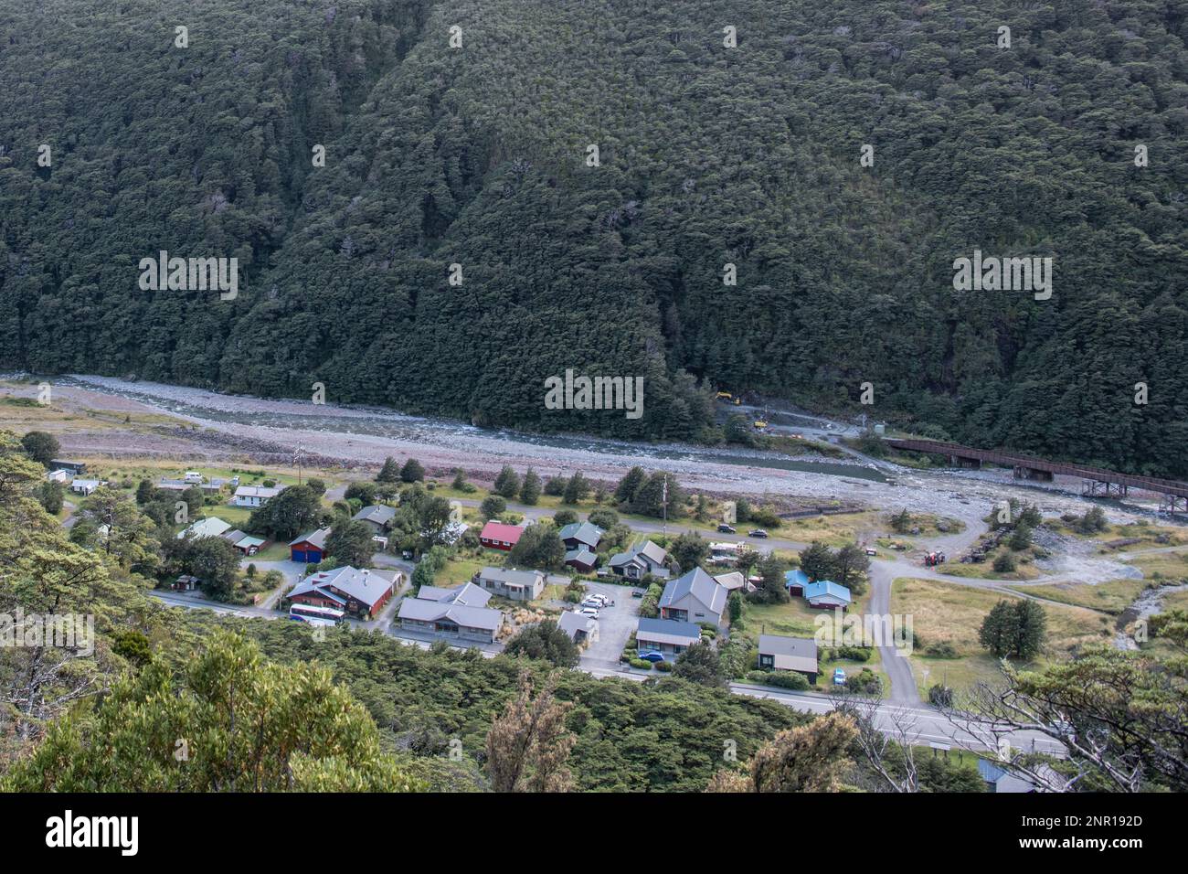 Arthurs pass village in a mountain valley in the Southern Alps of New Zealand seen from above. Stock Photo