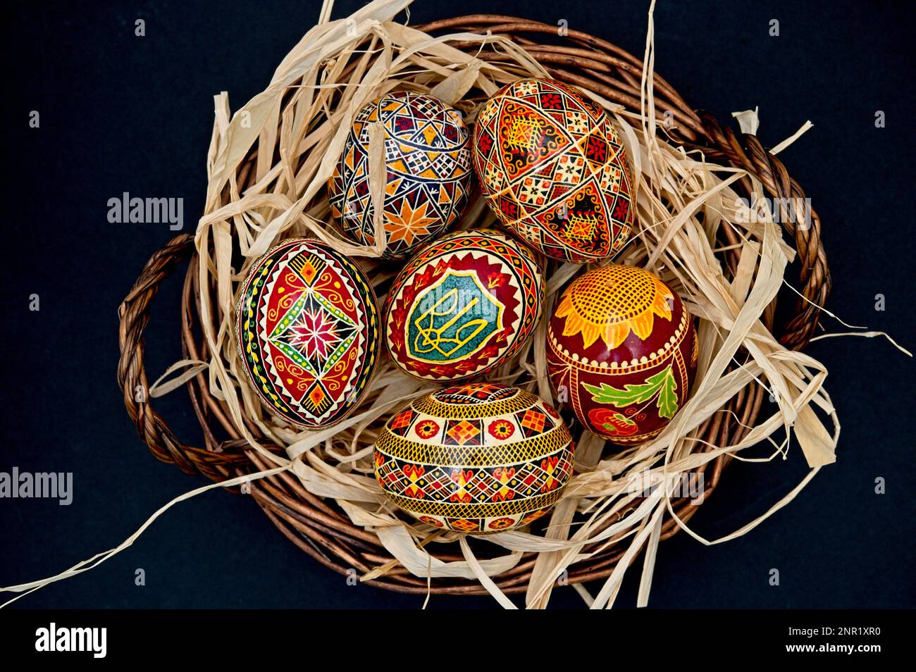 Pysanka, Pysanky Ukrainian Easter eggs with trident and sunflower Stock Photo