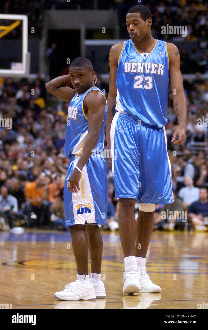 Earl Boykins of the Denver Nuggets stands next to teammate Marcus Camby  during 101-99 loss to the Los Angeles Lakers in an NBA basketball game at  the Staples Center on Friday, Dec.