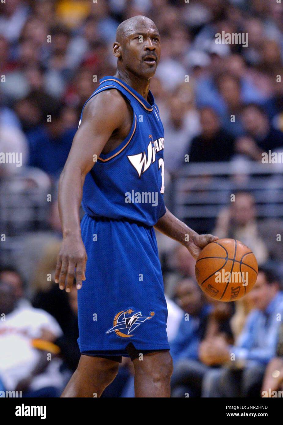 Michael Jordan of the Washington Wizards (23) dribbles the ball 