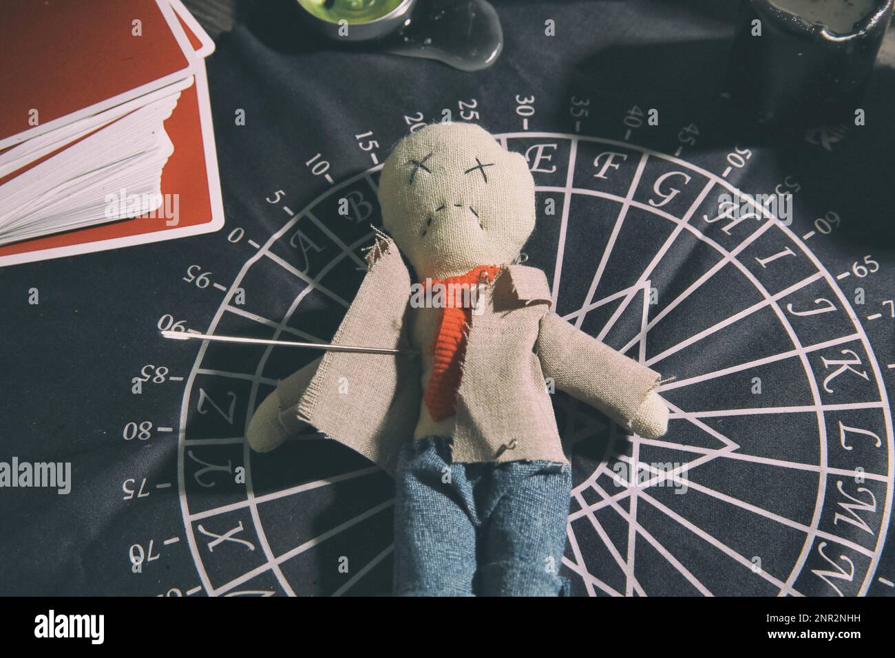 Handmade voodoo doll with red heart and button eyes – featured in beginner-friendly PDF sewing tutorial