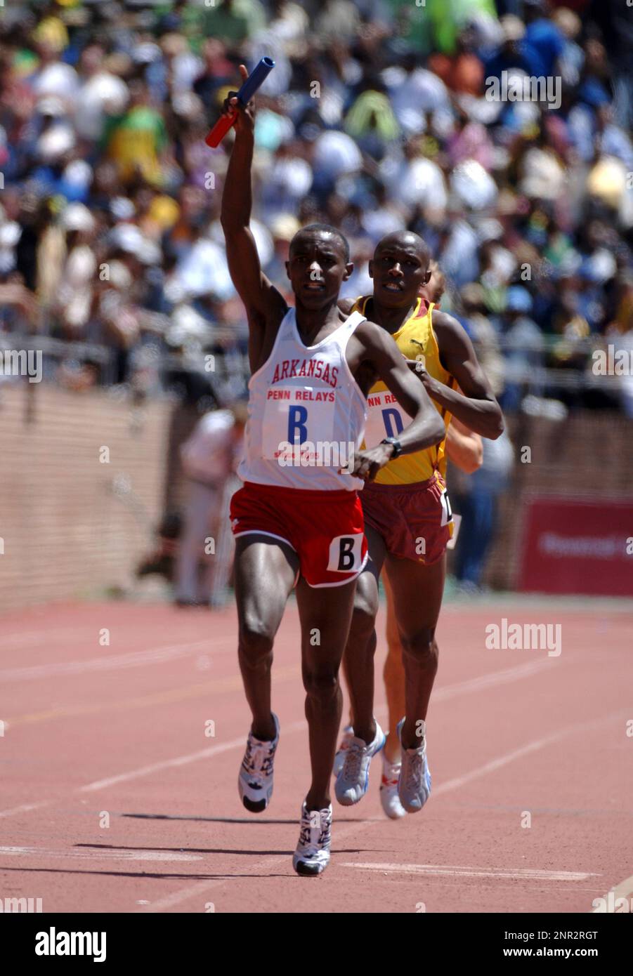 Josphat Boit of Arkansas celebrates after overtaking Richard Kiplagat ...