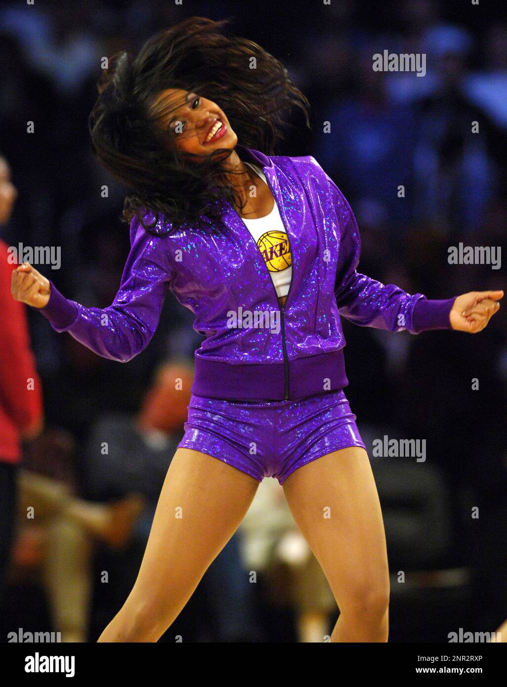 Los Angeles Laker girls cheerleader Amber Ory dances during an NBA  basketball game against the Sacramento Kings at the Staples Center on  Wednesday, March 24, 2004. (Kirby Lee via AP Stock Photo - Alamy