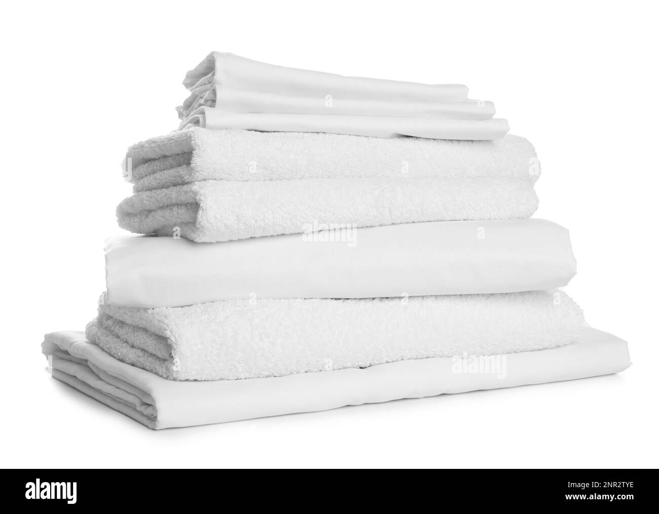 Stack of towels and bed sheets on white background Stock Photo Alamy