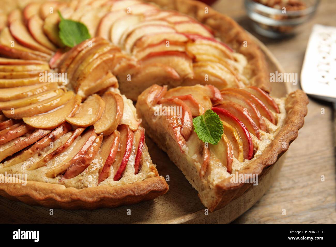 Delicious apple pie on wooden table, closeup Stock Photo