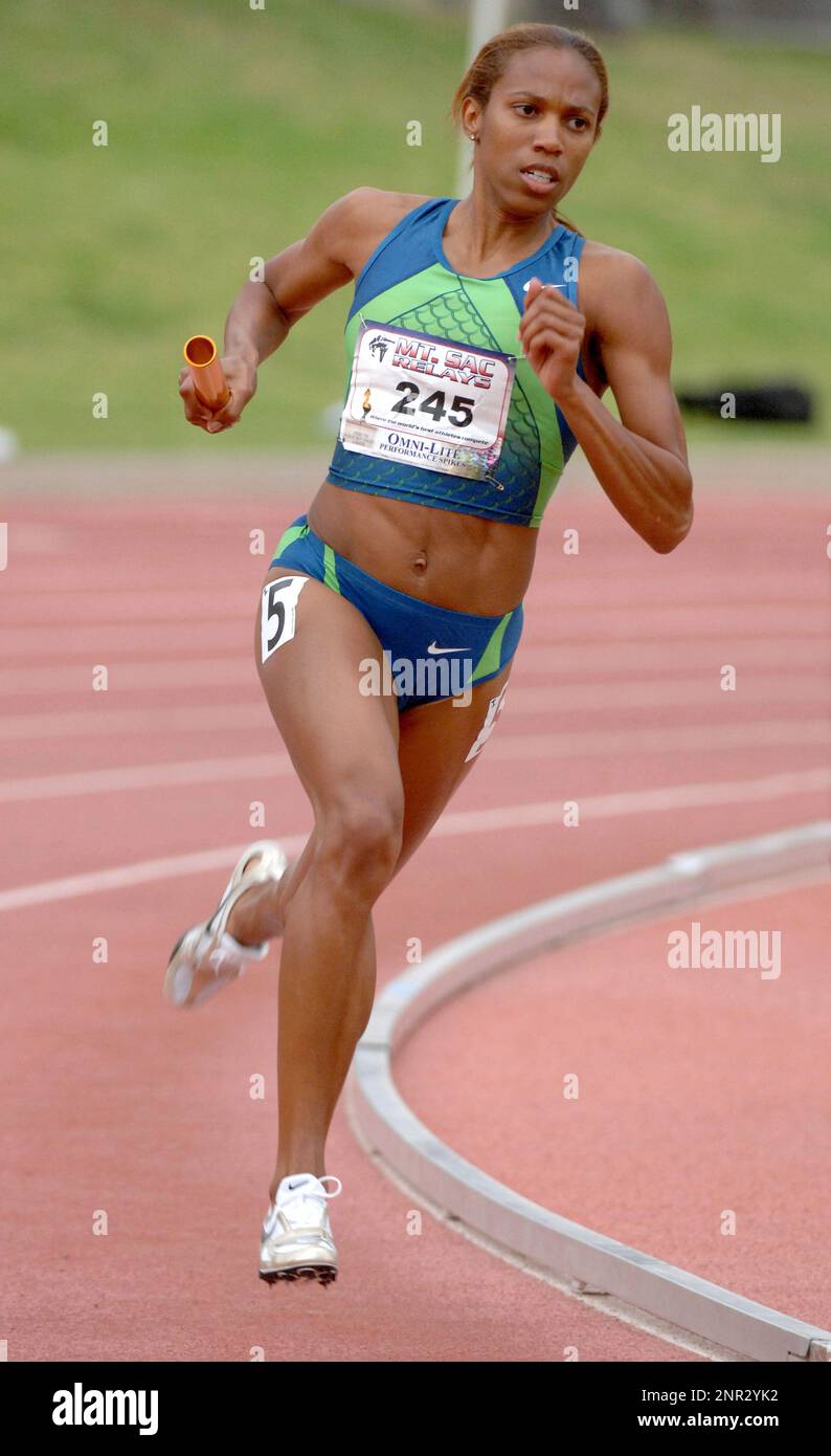 Julian clay runs a leg in the invitational women s 4 x 400 meter relay