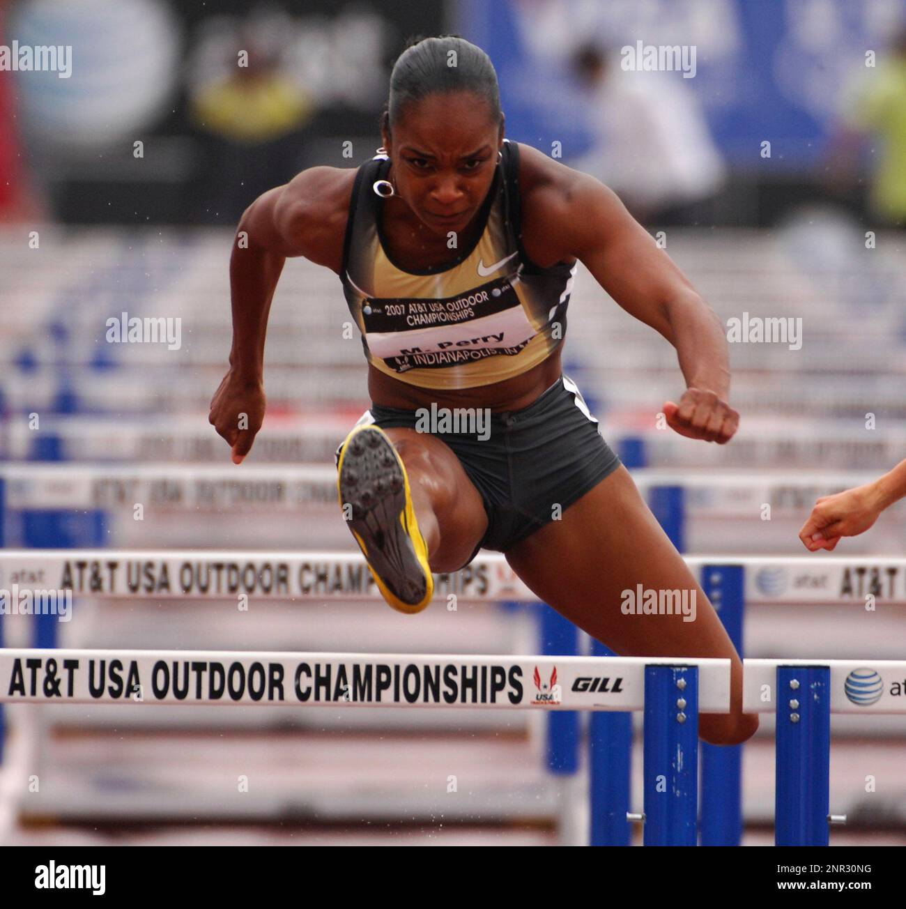 Michelle Perry wins women's 100meter hurdle semifinal in 12.87 in the