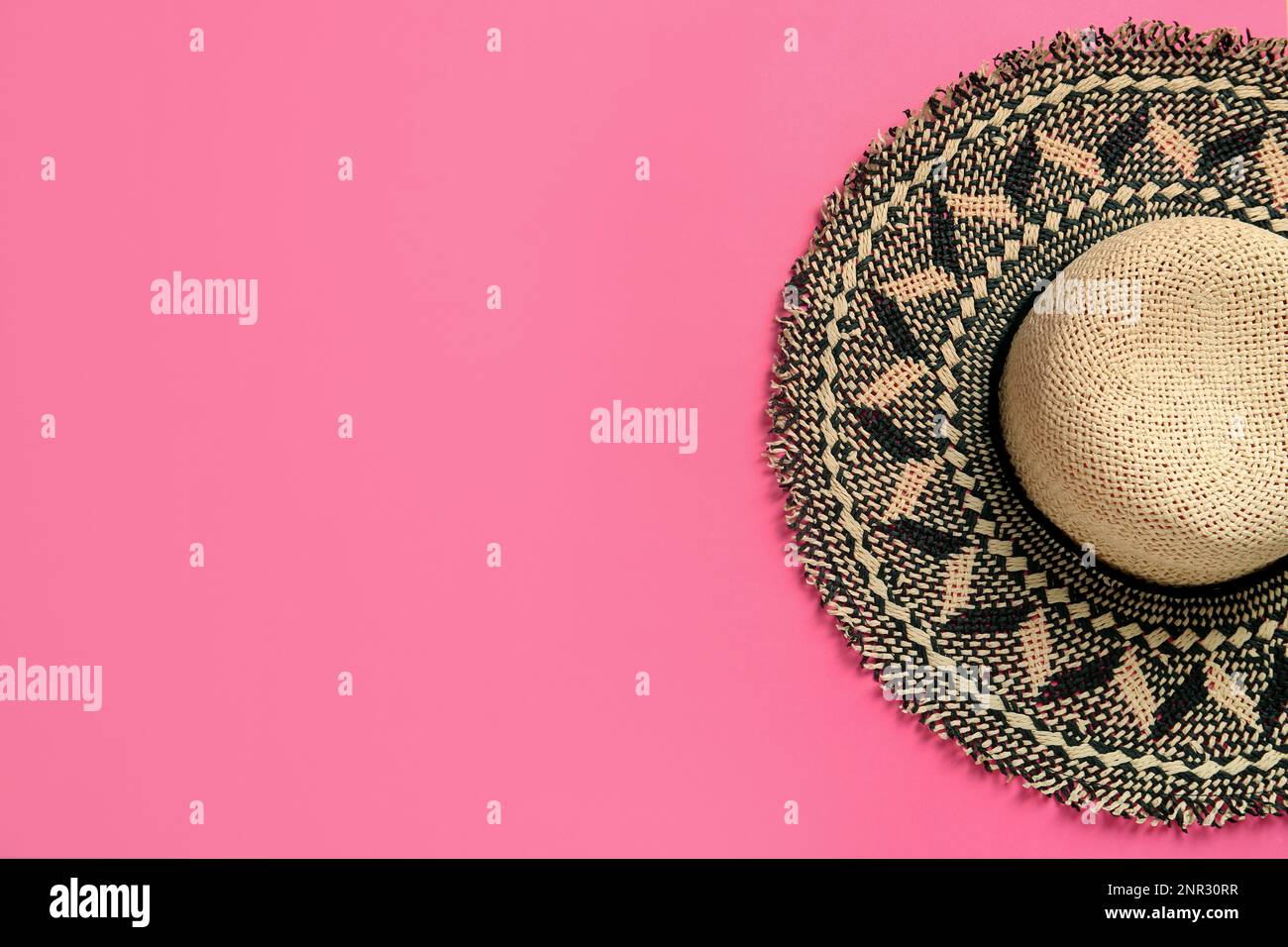 Stylish straw hat on pink background, top view. Space for text Stock ...