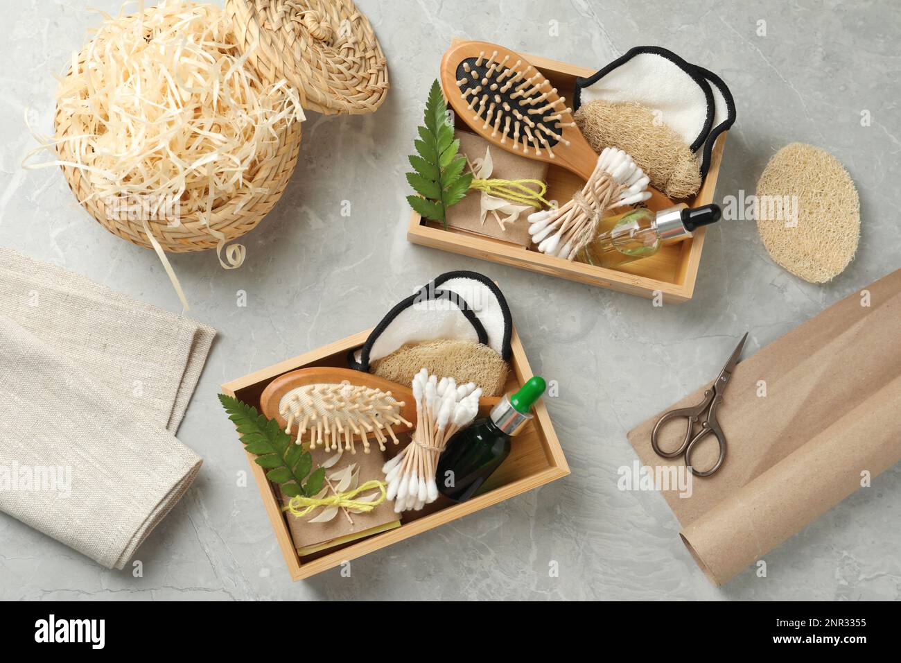 Flat lay composition with eco friendly products on grey table Stock ...