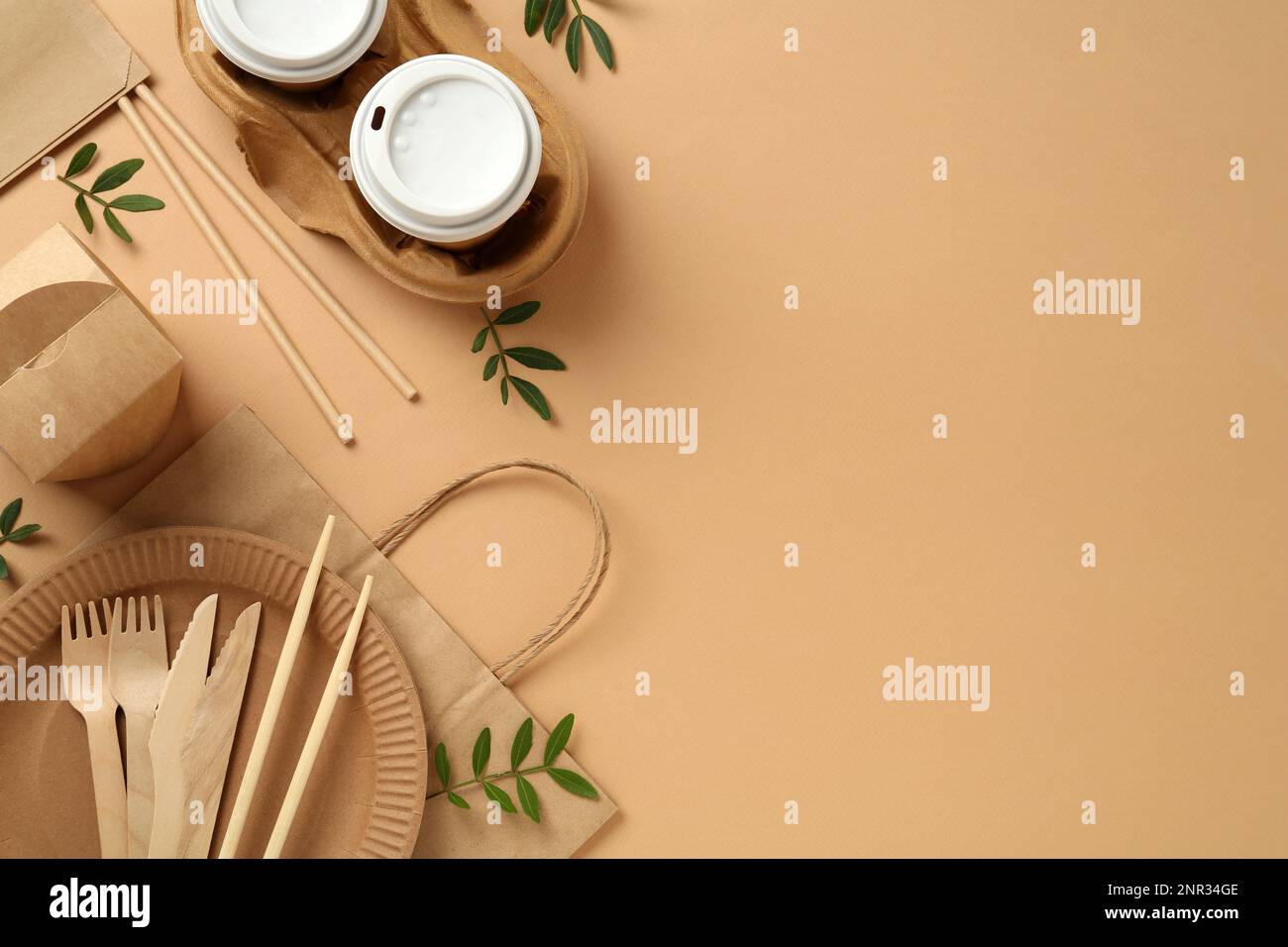 Flat lay of eco friendly products on beige background, space for text ...