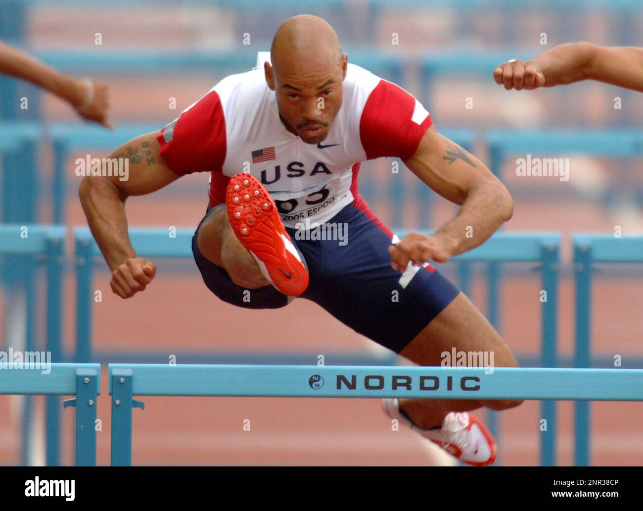 Dominique Arnold of the United States places second in firstround heat