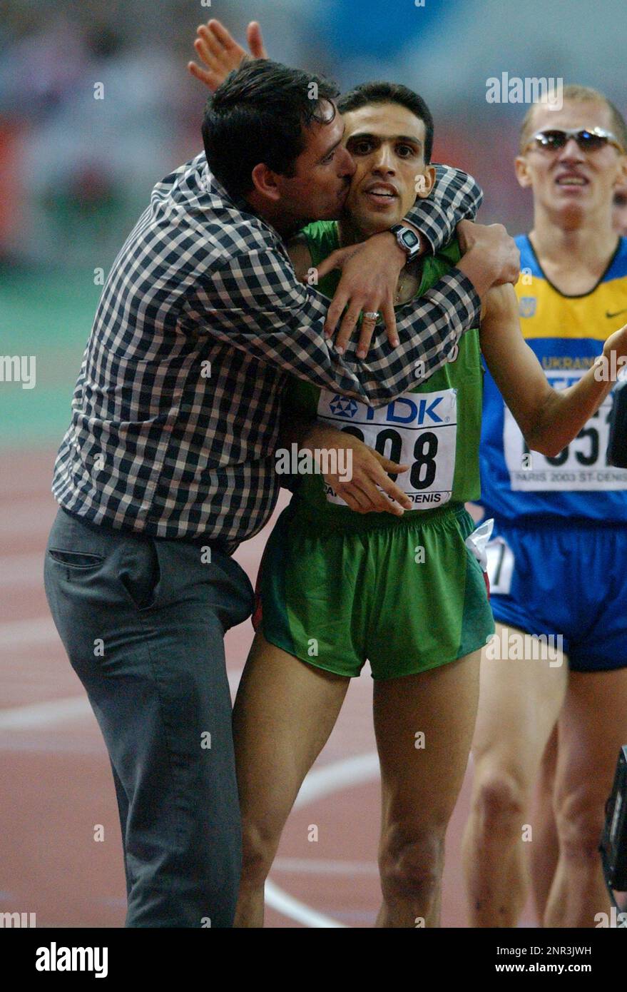 Hicham El Guerrouj of Morroco wins his fourth 1,500-meter title in the IAAF World Championships in Athletics at Stade de France on Wednesday, Aug. 27, 2003. (Kirby Lee via AP) Stock Photo