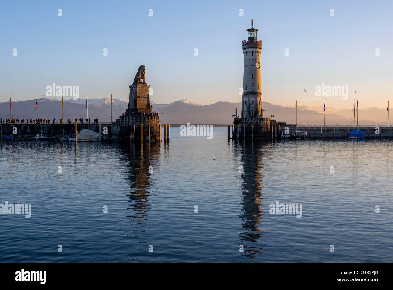 Harbour entrance of Lindau harbour, pier with New Lindau Lighthouse and ...