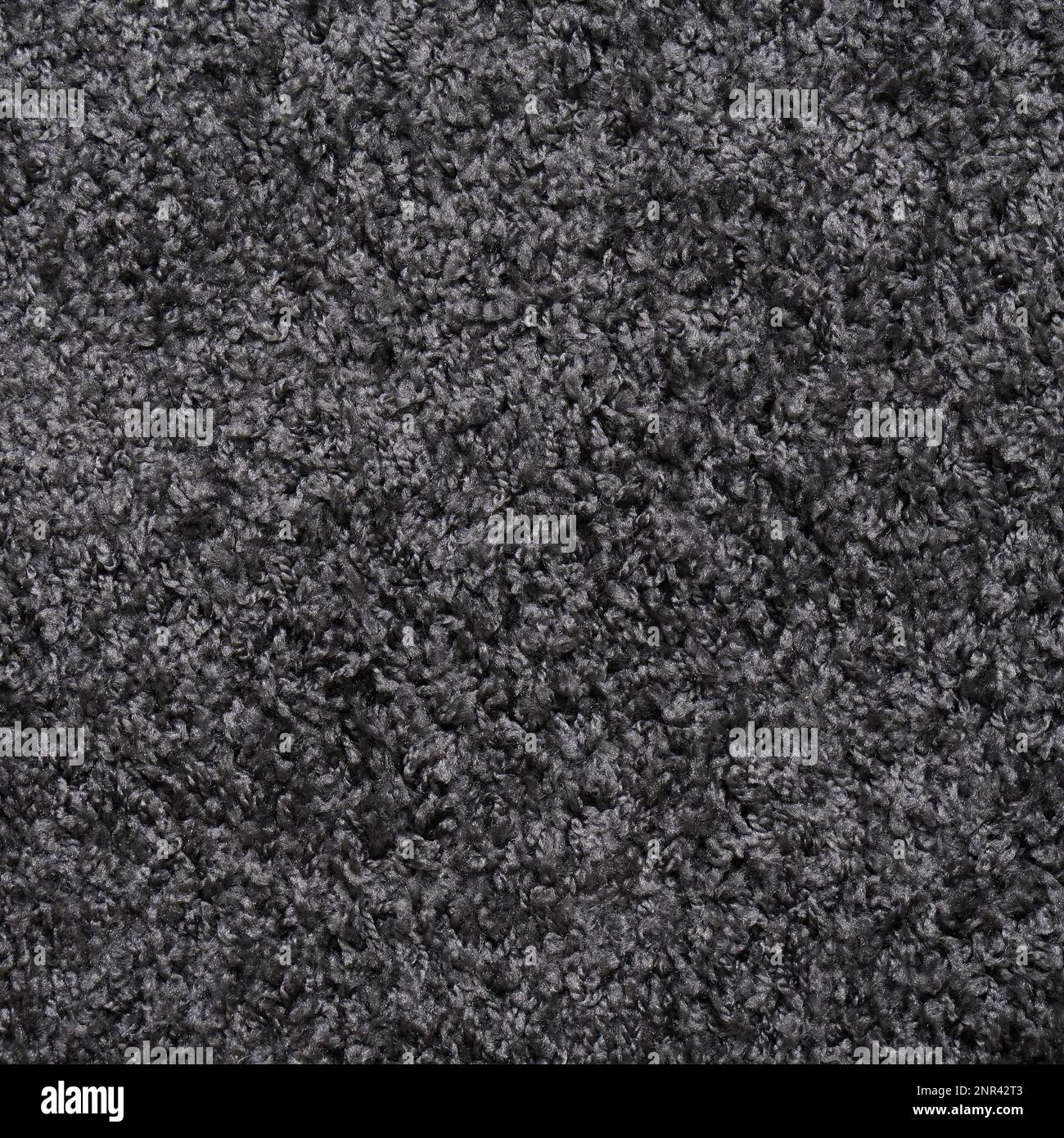 gray shaggy deep-pile carpet background texture Stock Photo