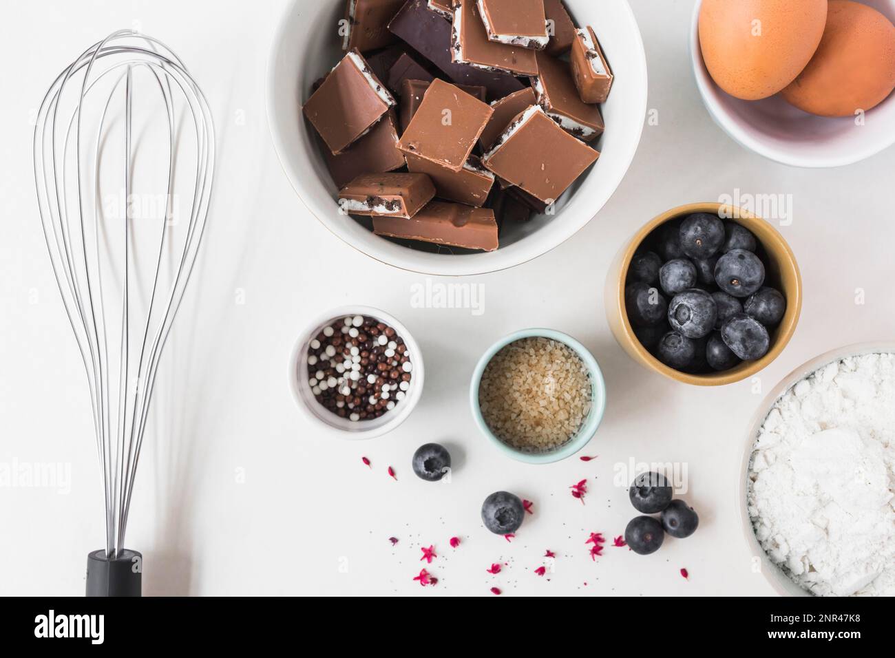 ingredients making cake with whisk white background Stock Photo Alamy