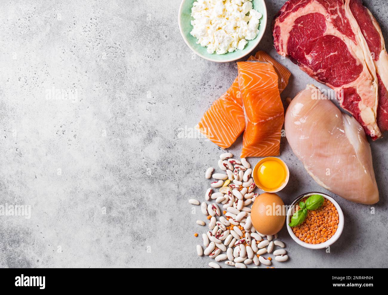 Assortment of natural sources of protein from food: meat, fish, chicken ...
