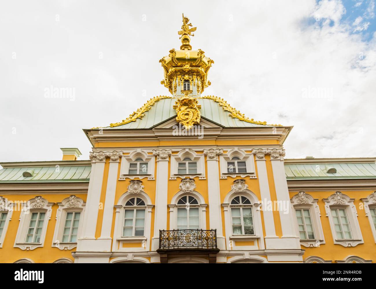 Ornate golden dome and cupola on the Peterhof Grand Palace in late summer, Petergof, Saint-Petersburg, Russia. Stock Photo