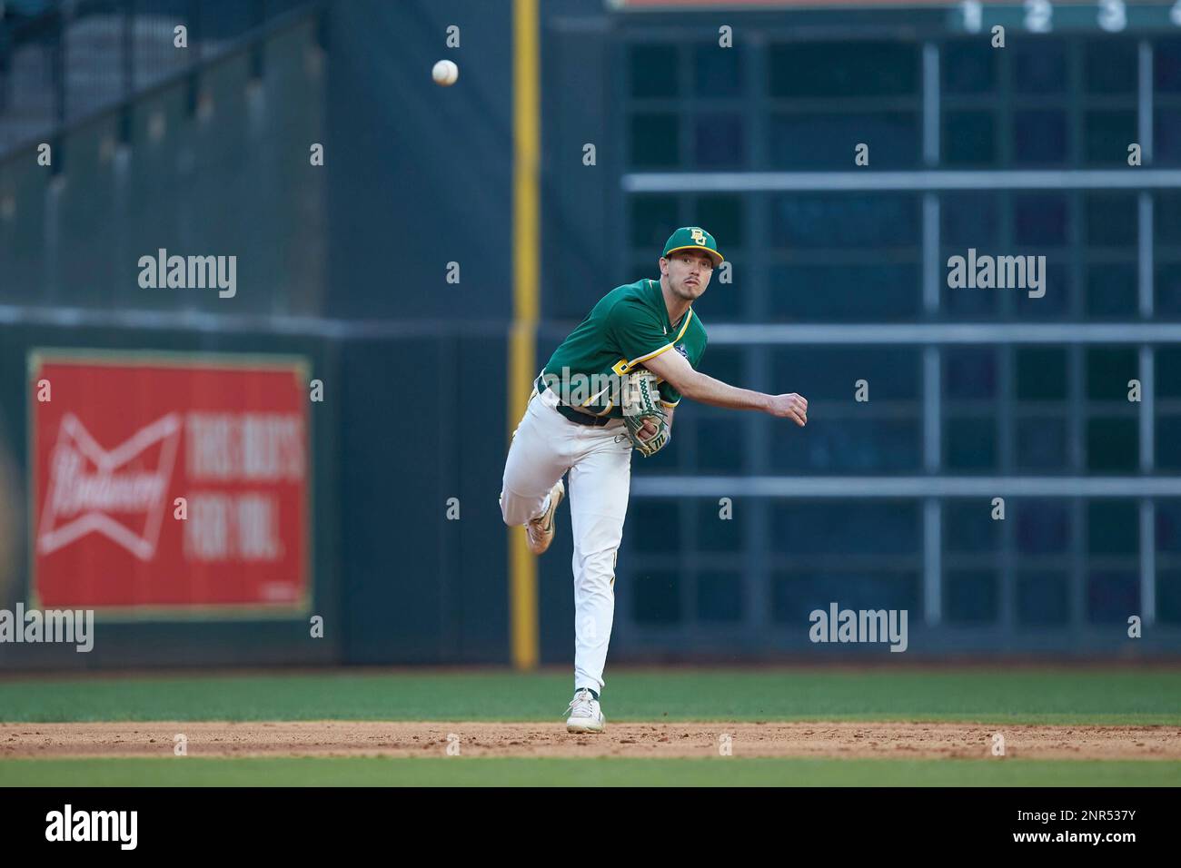 Baylor Bears shortstop Nick Loftin (2) makes a throw to first base