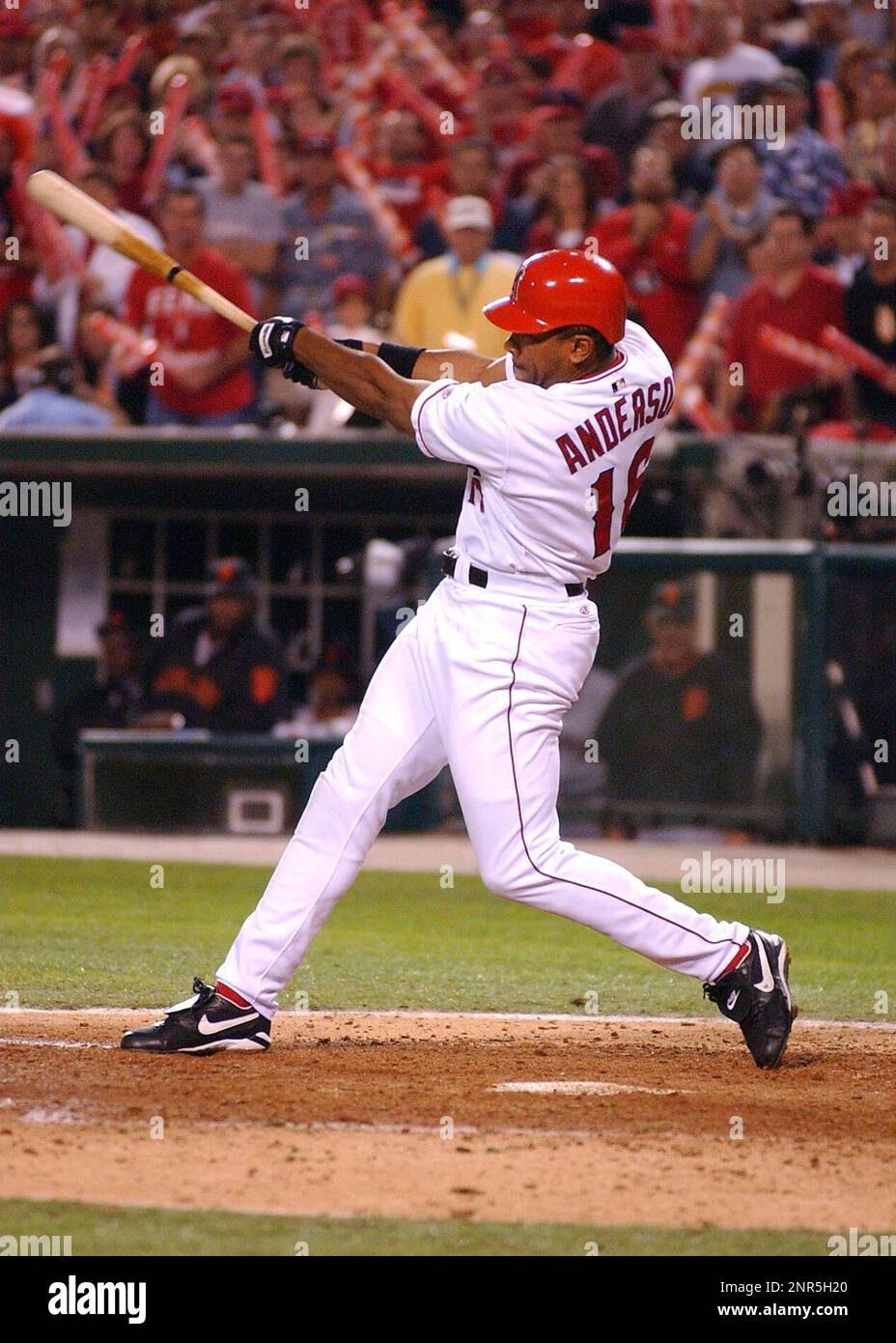 27 Oct. 2002: Anaheim Angels shortstop David Eckstein (22) and designated  hitter Shawn Wooten (44) kiss the World Series trophy in the clubhouse  after the Angels defeated the San Francisco Giants 4