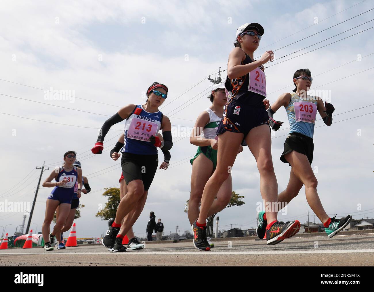 Nanako Fujii (2nd from R, 21) is competing during the Women's 20 km ...