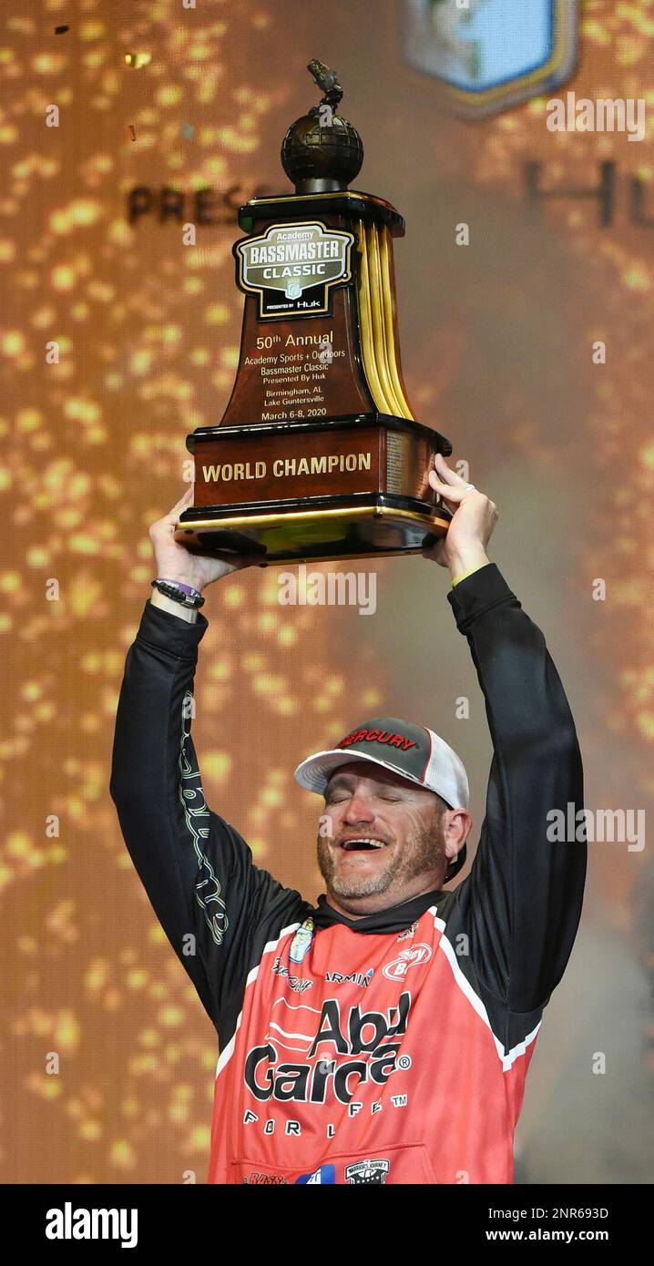 Hank Cherry celebrates as he wins in the 50th annual Bastmaster Classic  with a total catch of 65 pounds 5 ounces on the waters of Lake  Guntersville, during the final weigh-in at