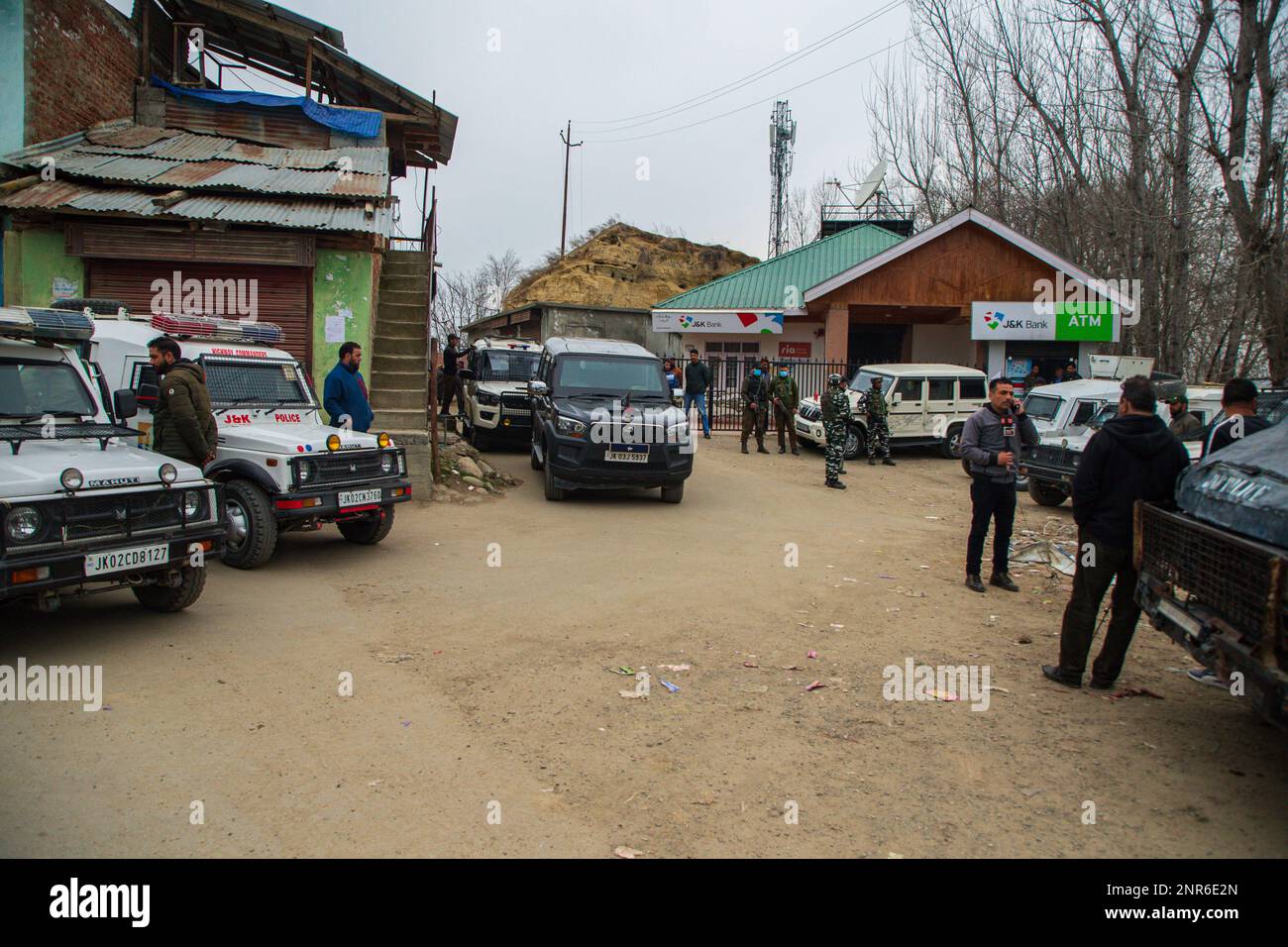 Srinagar, India. 25th Feb, 2023. Indian paramilitary troopers stand on guard at the attack site where Sanjay Sharma a Kashmiri Hindu bank security guard was shot dead by suspected militants in Pulwama South of Indian administered Kashmir. Police said suspected militants opened fire on Sanjay Sharma while he was on his way to a local market in Achan village Pulwama district. (Photo by Faisal Bashir/SOPA Images/Sipa USA) Credit: Sipa USA/Alamy Live News Stock Photo