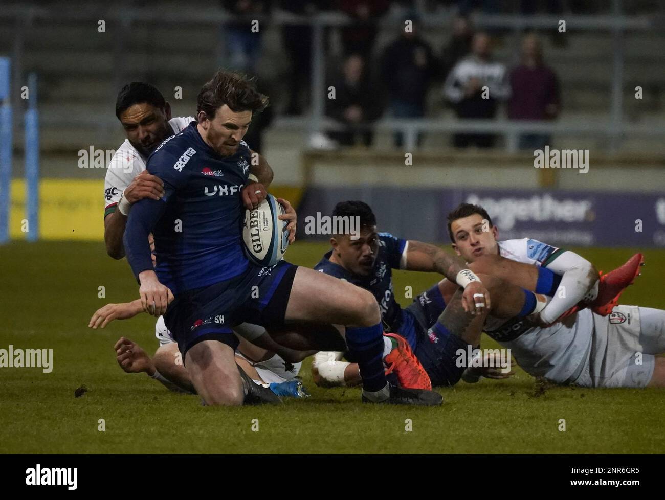 Sale Sharks full-back Simon Hammersley is tackled by London Irish centre Curtis Rona during a Gallagher Premiership Rugby Union match, won by Sharks 39-0, Friday, Mar