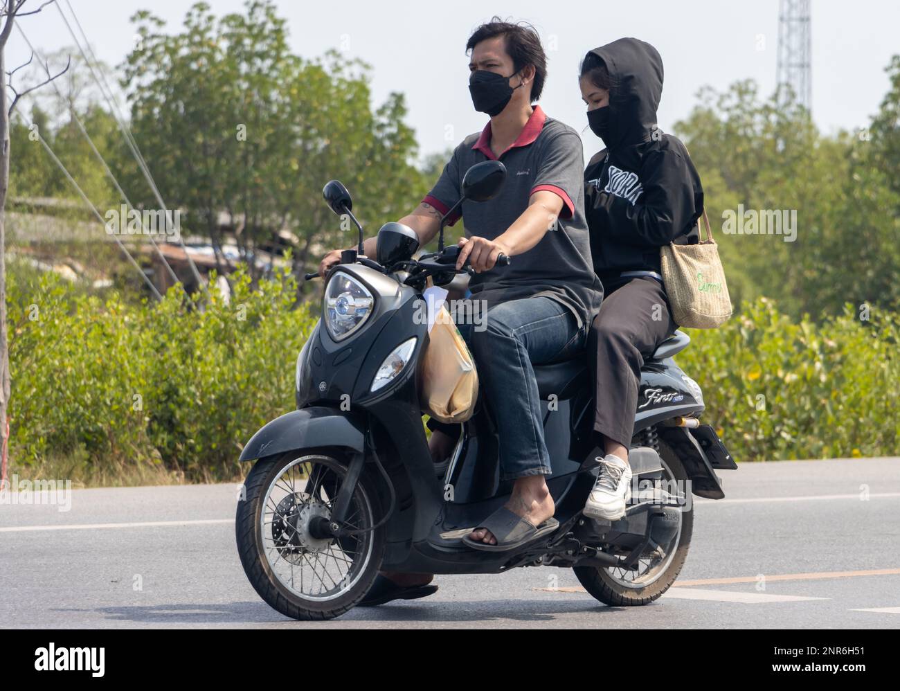 BANGKOK, THAILAND, FEB 07 2023, The pair rides on motorcycle Stock ...