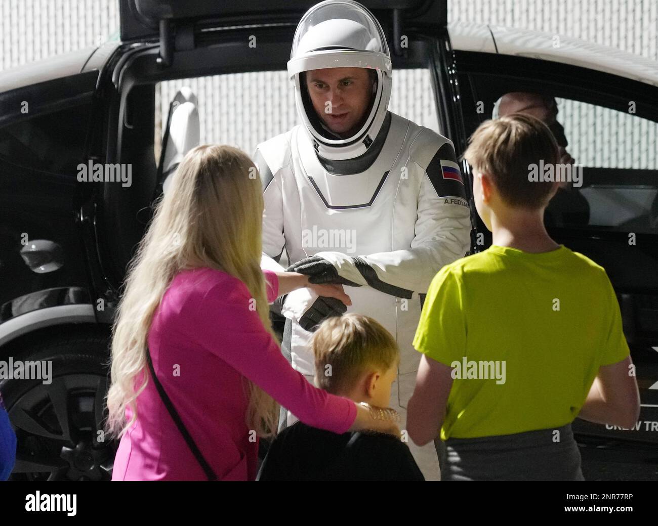 Kennedy Space Center, United States. 26th Feb, 2023. Roscosmos cosmonaut Mission Specialist Andrey Fedyaev talks to his wife and sons as the SpaceX NASA Crew 6 prepare to board the Crew Dragon spacecraft 'Endeavour' at Kennedy Space Center, Florida on Sunday, February 26, 2023. The other crew members are NASA astronaut Pilot Warren 'Woody' Hoburg, NASA astronaut Commander Stephen Bowen and UAE Mission Specialist Sultan Alneyadi. Photo by Pat Benic/UPI Credit: UPI/Alamy Live News Stock Photo
